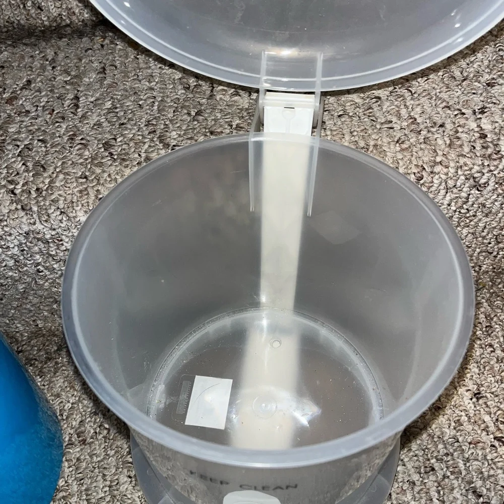 Dorm Ready! The container store trash barrel with removable inside barrel.